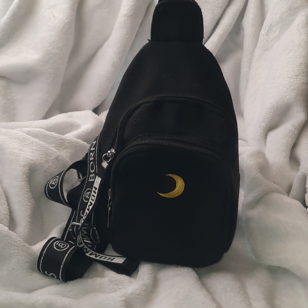 Moon embroidered pocket front sling bag